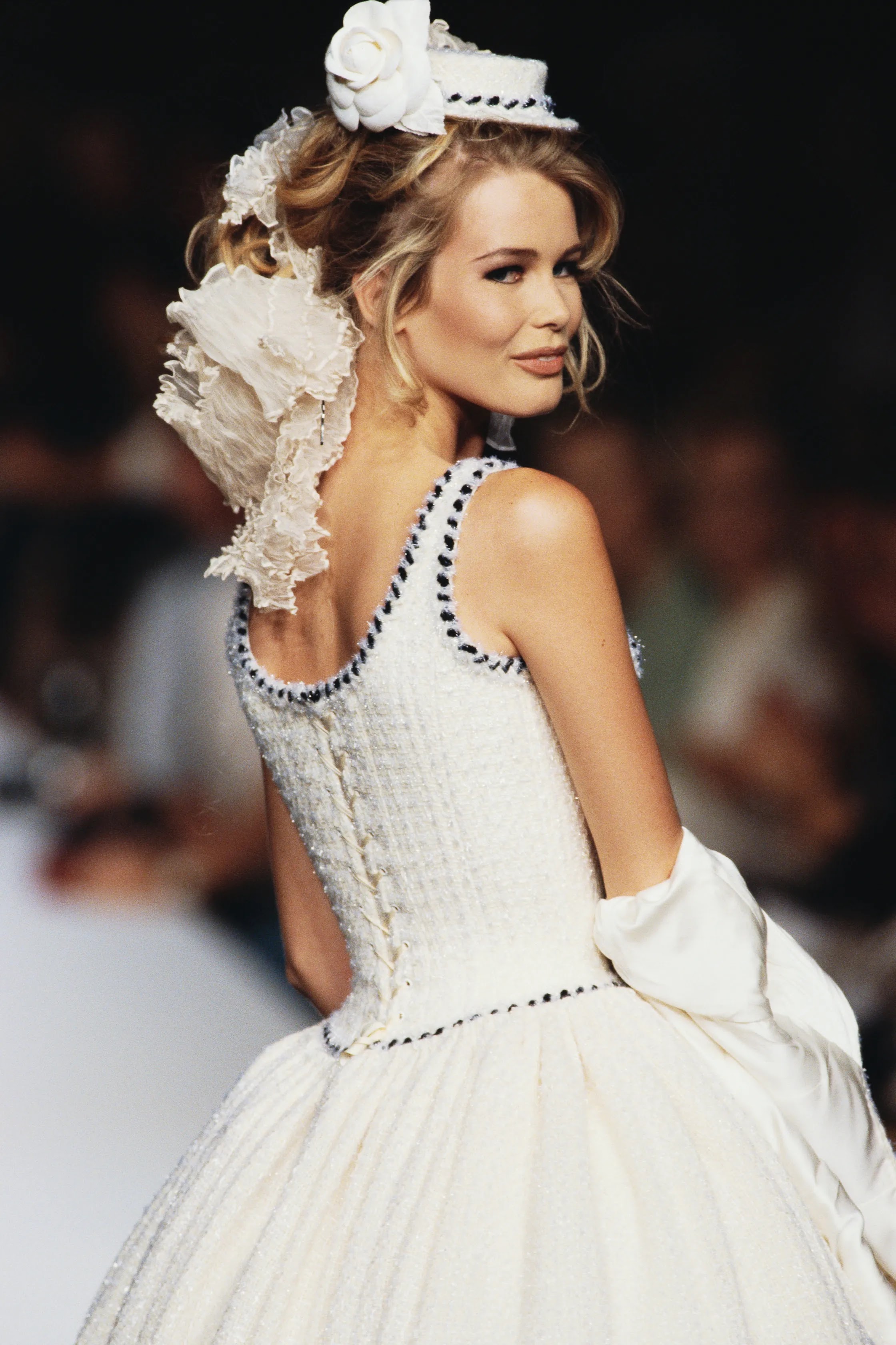 Dua Lipa wears Claudia Schiffer's iconic 1992 Chanel bridal tweed gown