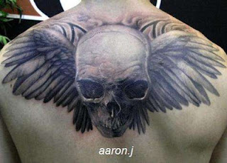 winged skull tattoo