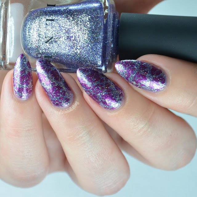 purple nail polish with flowers