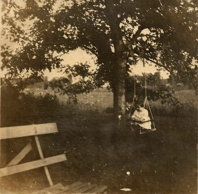 Catherine Wright on a swing