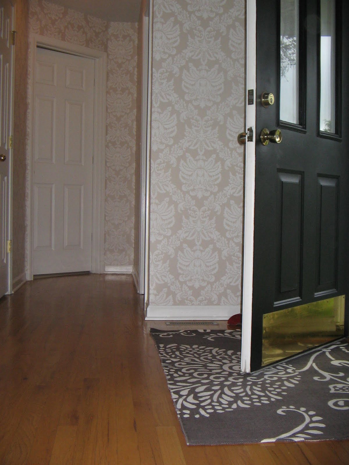 Simple Dwellings: The Foyer Wallpaper is Up - Before and Afters ...