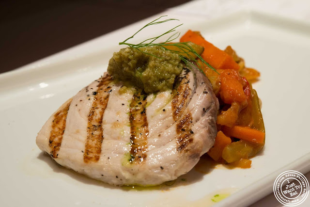 image of grilled swordfish, Castelvetrano tapenade and Sicilian caponata at Aroma Kitchen and Wine Bar