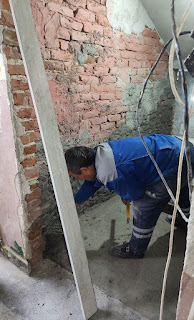 Bekir working on the walls