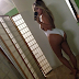 Kim K posts first post baby bikini pic online & Kanye West responds