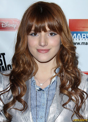 Bella Thorne Long Curly Hairstyle with Bangs