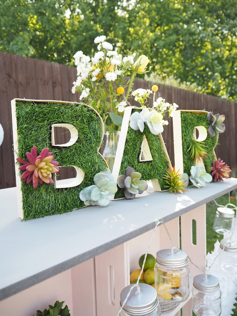 DIY tutorial for an outdoor bar using wooden crates, plus artificial grass bar letters to decorate. Perfect for summer BBQ's or garden parties. 