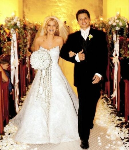  Nick Lachey on October 26 2002 in a romantic lace Vera Wang gown