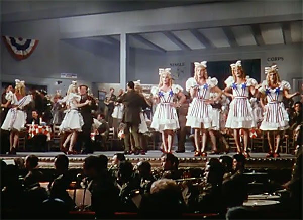 Femulating as Stage Door Canteen hostesses in the 1943 film This is the Army.