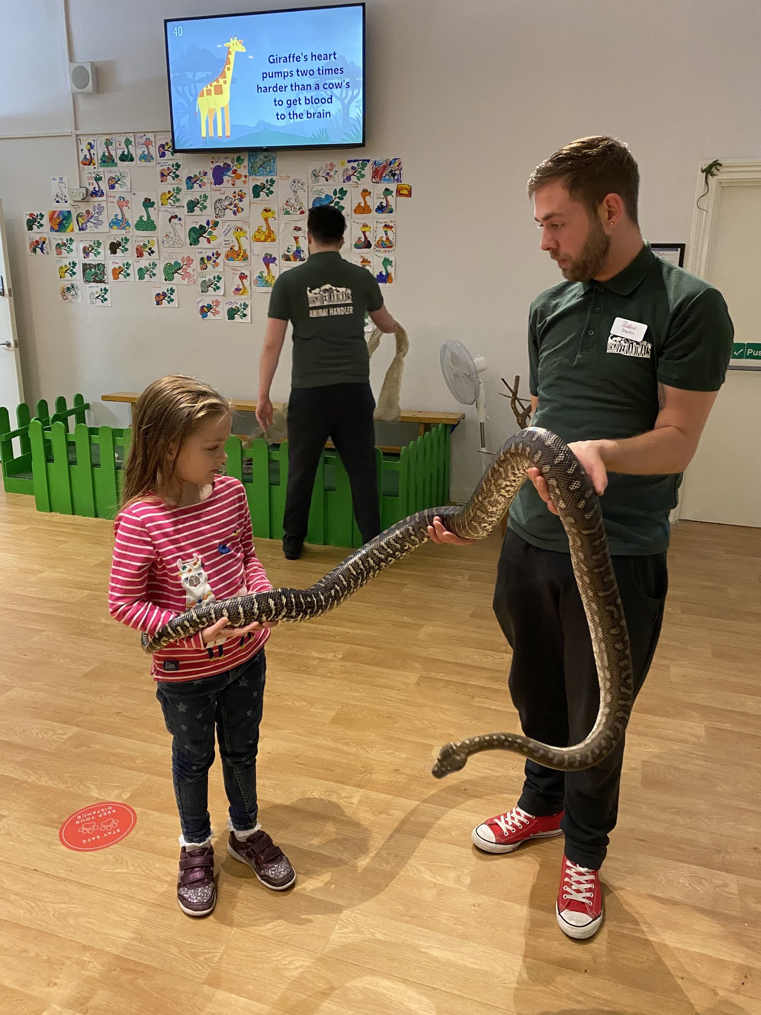 girl holding a snake