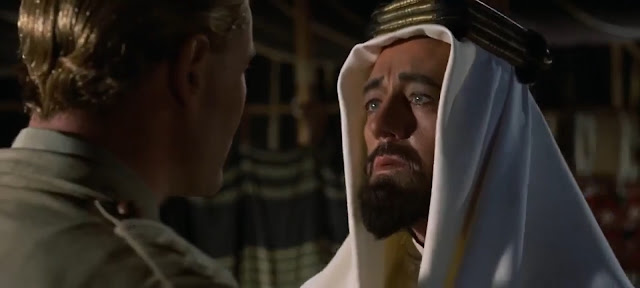 Prince Faisal (Alec Guinness) takes Lawrence's measure.