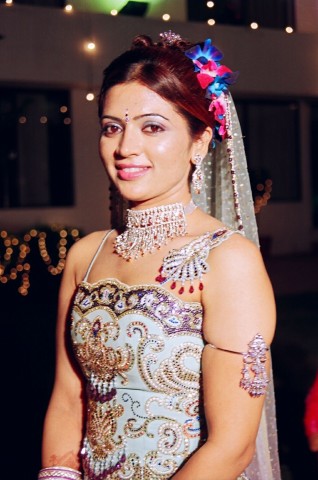 In India the bride wears colors like red maroon pink gold orange