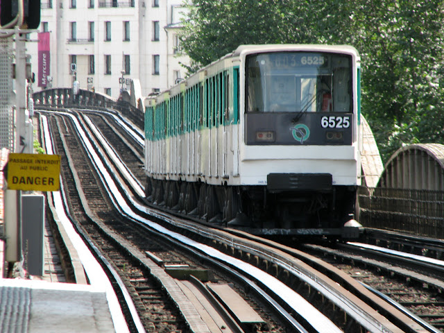 Line 6 train leaving the metro station of Bir-Hakeim, Boulevard de Grenelle, Paris