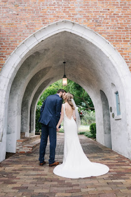 bride and groom kiss