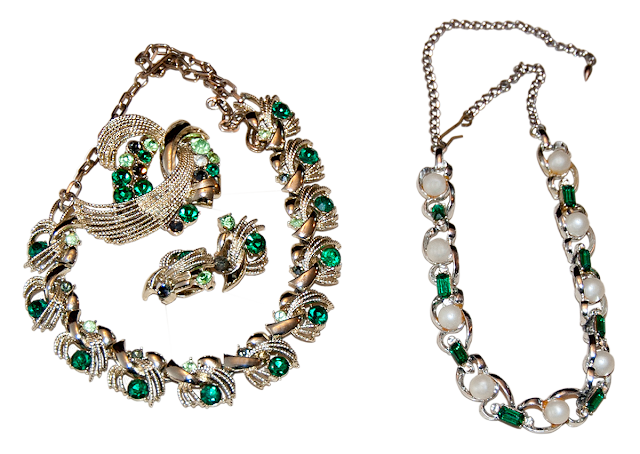 Two costume jewellery necklaces of gold-dipped chain, pearl and green rhinestones.