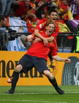 Fernando Torres celebrates after scoring against Sweden
