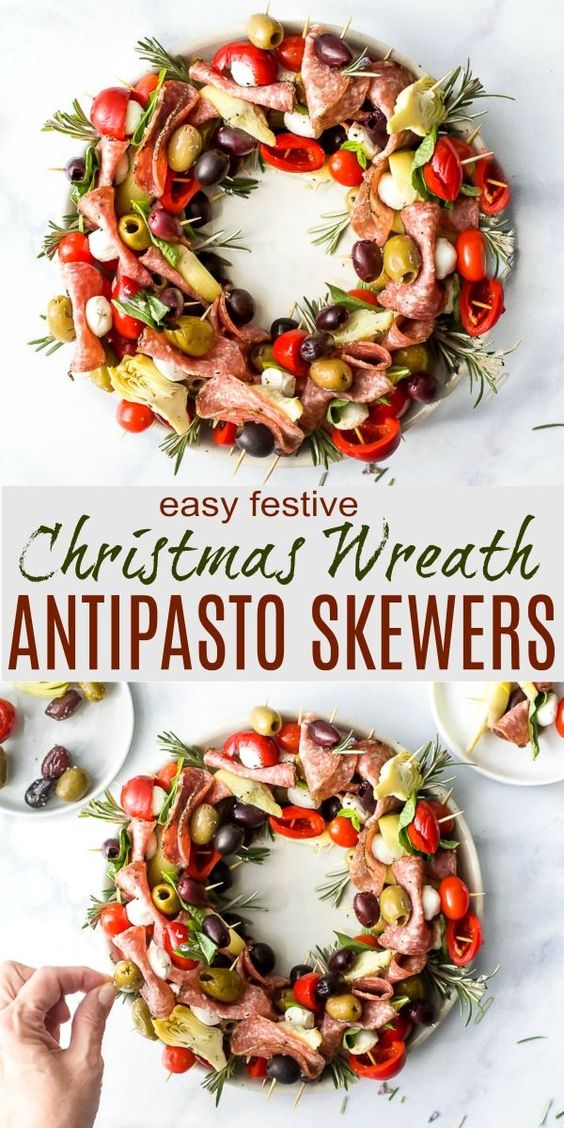 Festive Christmas Wreath Antipasto Skewers with peppered salami, mozzarella balls, olives, cherry peppers, artichokes and fresh basil. An easy healthy appetizer that's perfect for the holidays.