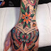 Awesome Flower And Butterfly Combination Tattoo On Hand