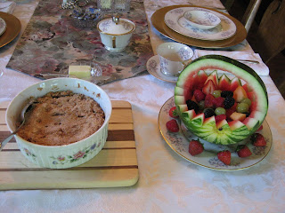 David's apple crisp (on left) and Susan's carved watermelon basket filled with fresh, cut fruit