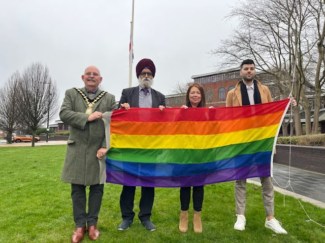 Photo waving the LGBT rainbow flag in Sandwell