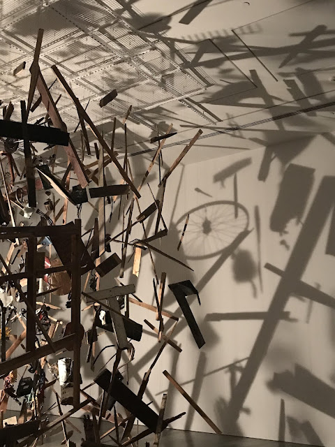 Photo of Cornelia Parker installation "Cold Dark Matter: An Exploded View 1991", exhibited in the MCA Sydney, 2019