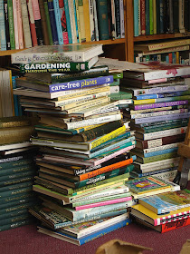 stacks of gardening books