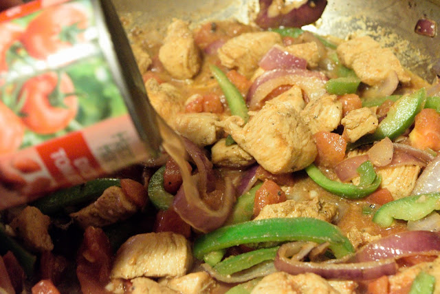 Water being added to the chicken fajita pasta.  