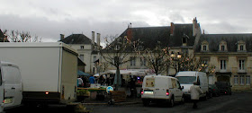 Place des Halles, Preuilly sur Claise, decorated for Christmas.  Indre et Loire, France. Photographed by Susan Walter. Tour the Loire Valley with a classic car and a private guide.