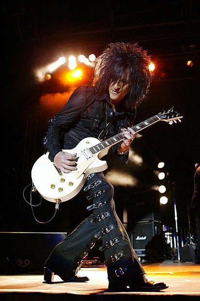 I've always known Steve Stevens to be Billy Idol's guitar player