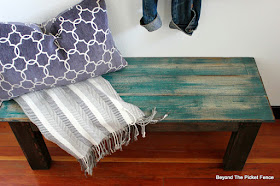 farmhouse style bench with teal paint and dark stain