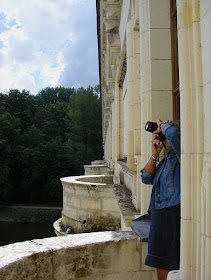 Photographer on newly accessible balcony at Chenonceau during Covid19 restrictions.  Indre et Loire, France. Photographed by Susan Walter. Tour the Loire Valley with a classic car and a private guide.