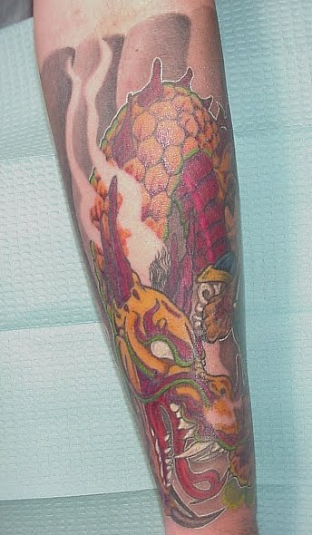 Dragon tattoo on forearm