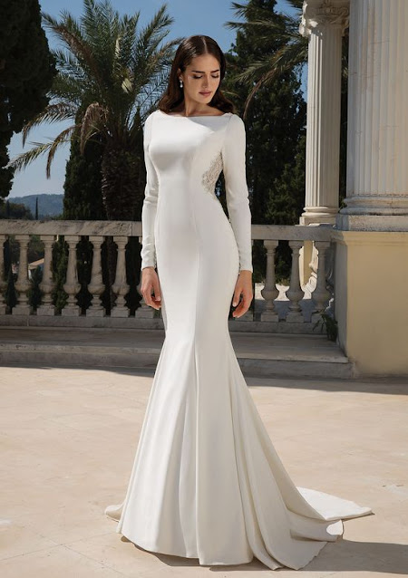 Weddings by K'Mich - wedding planning - wedding dresses - crepe long sleeve fit and flare white gown - justin alexander