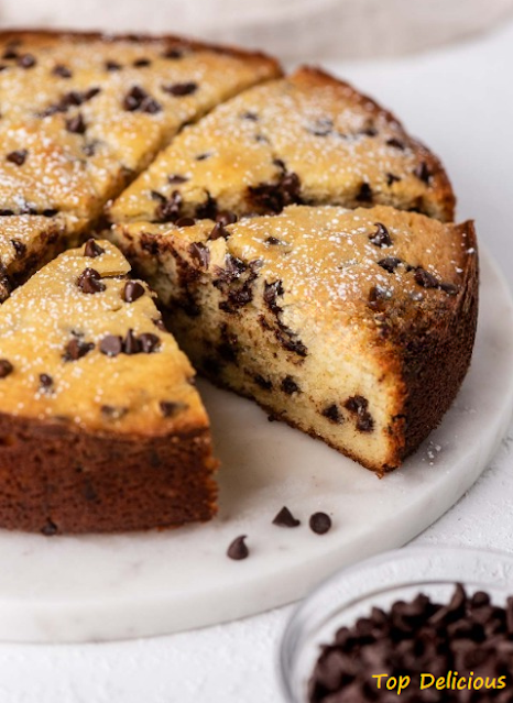 portion of ricotta cake with chocolate pipettes