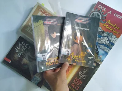 gambar buku disampuli plastik