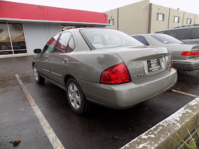 2004 Nissan Sentra with overall paint job from Almost Everything Auto Body.