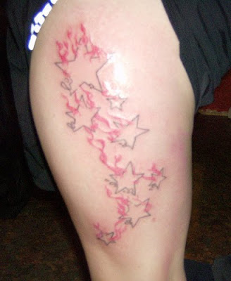 large thigh tattoo star