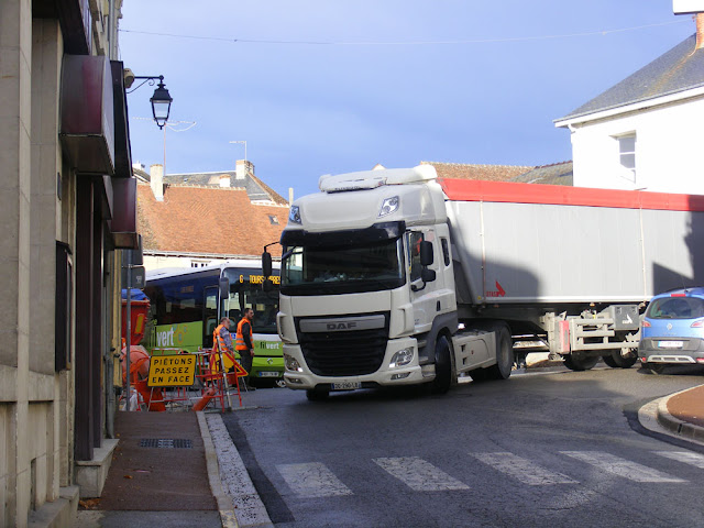 Truck navigates a village main street, Indre et Loire, France. Photo by Loire Valley Time Travel.