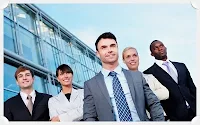 A picture showing a group of MBA students smiling