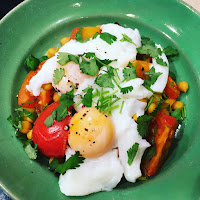 Poached eggs with spicy Indian chickpeas