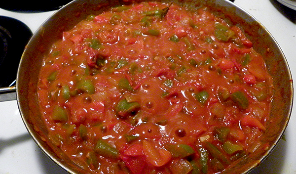Tomato sauce simmering in skillet