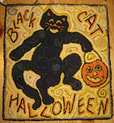 Black Cat Halloween. I finally finished the Halloween rug.