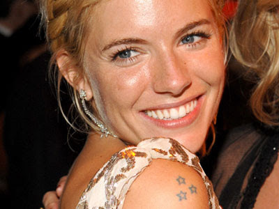 Best celebrity tattoos Sienna Miller shoulder stars tattoo