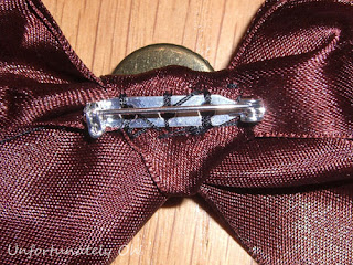 bead and ribbon with detachable bow brooch necklace