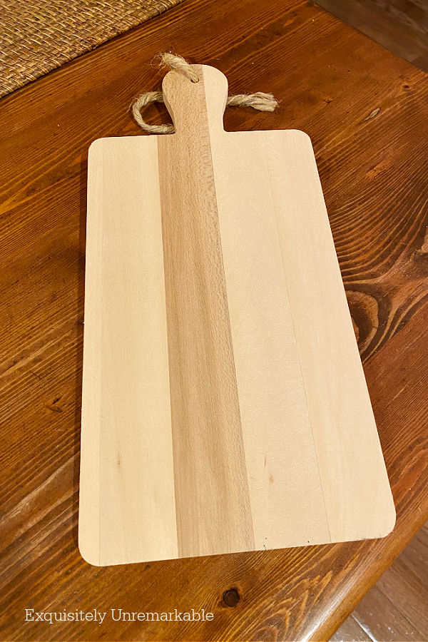 Wooden Thrift Store Cutting Board on table
