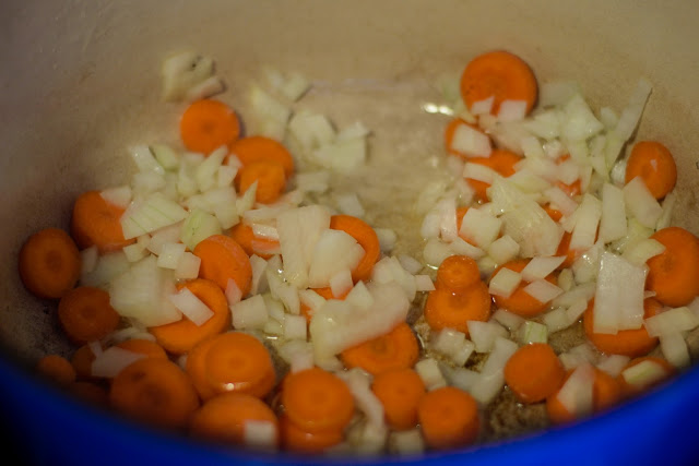 Carrots and onion sautéing in the pot.