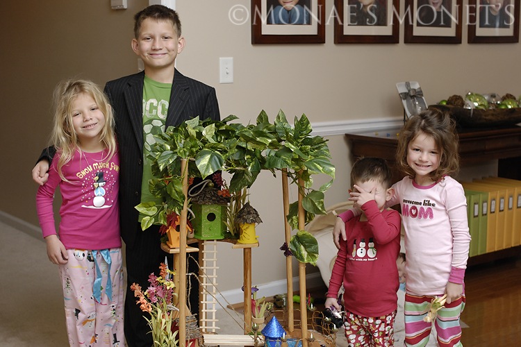 Austin and Scott with girls with fairy house blog