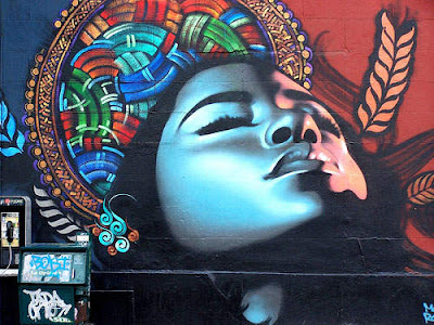 graffiti_murals_woman_face_art_on_wall