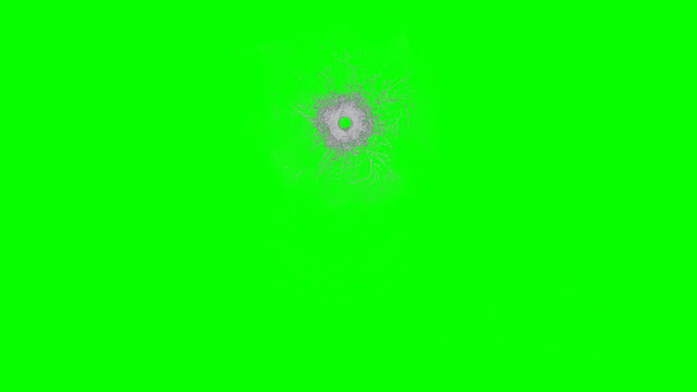 A simulated bullet hole in glass on a green background.