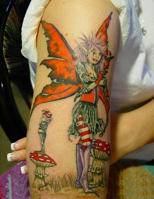 hand tattoo,fairy tattoo,colorfull tattoo