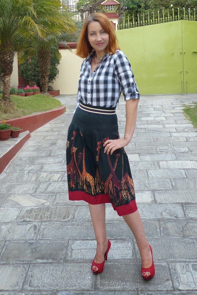 Checkered shirt, African theme skirt